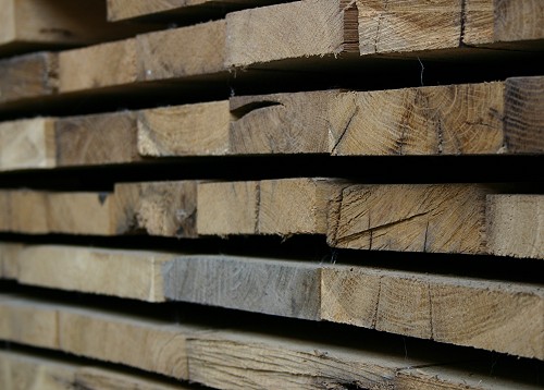 Fresh off the saw and still rough, planks of antique oak