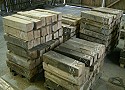 Reclaimed oak beams sawn up for cabinet-makers/carpenters